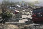 Death toll from Indonesia floods, landslides hits 68