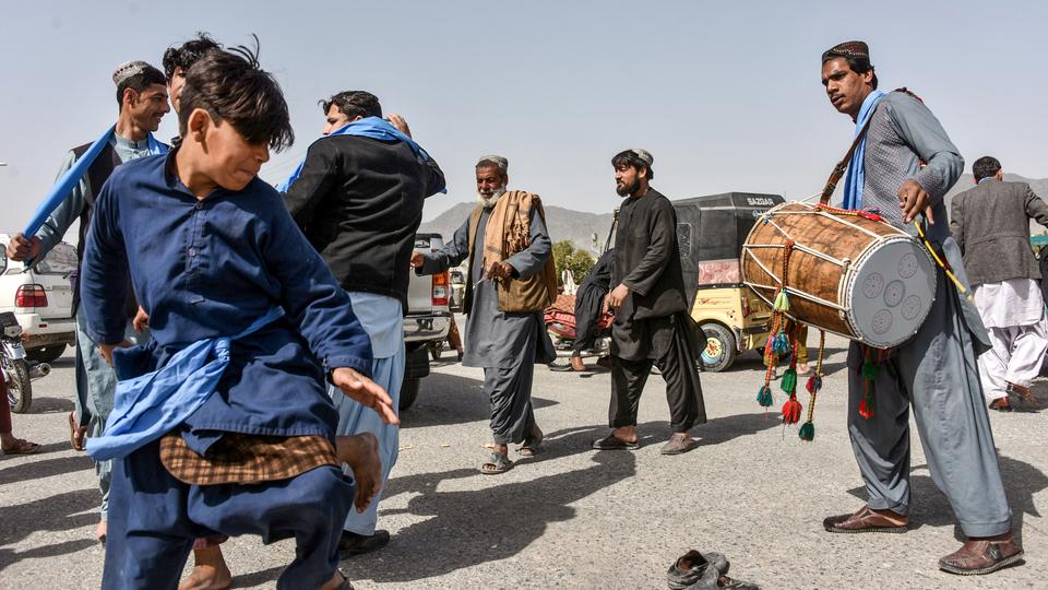 Civilians celebrate as partial truce mostly holds in Afghanistan