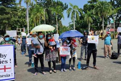 Afghan refugees protest against ten years of misery in Indonesia