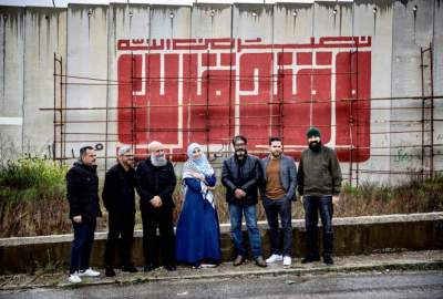 "And victory is near"; An artistic event promising the liberation of Quds Sharif on the barrier wall with occupied Palestine in southern Lebanon