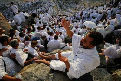 Pilgrims from all over the world pray on Mount Arafat in Hajj