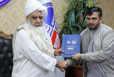 Signing a memorandum of cooperation between the National Disaster Preparedness Department and an international aid organization