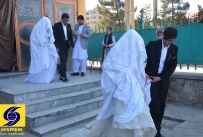 تصاویر/ برگزاری مراسم عروسی دسته‌جمعی ۴۲ زوج جوان به‌مناسبت میلاد امام مهدی(عج) در کابل  